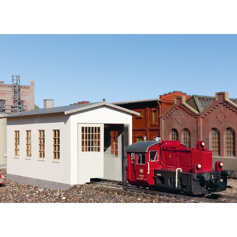 Petit kit de construction de hangar de locomotive.